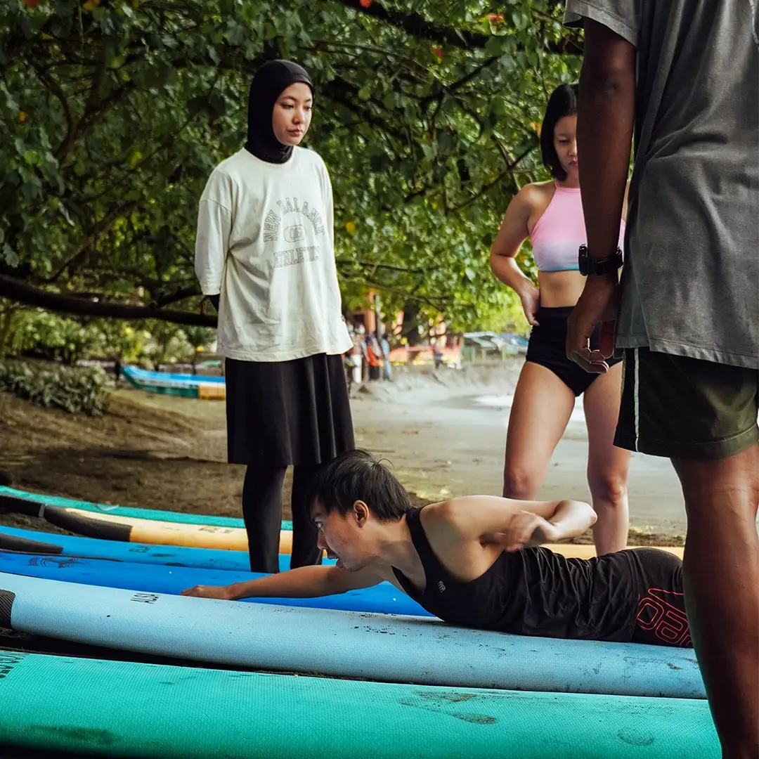 Learn surfing basics on the gentle beginner waves.