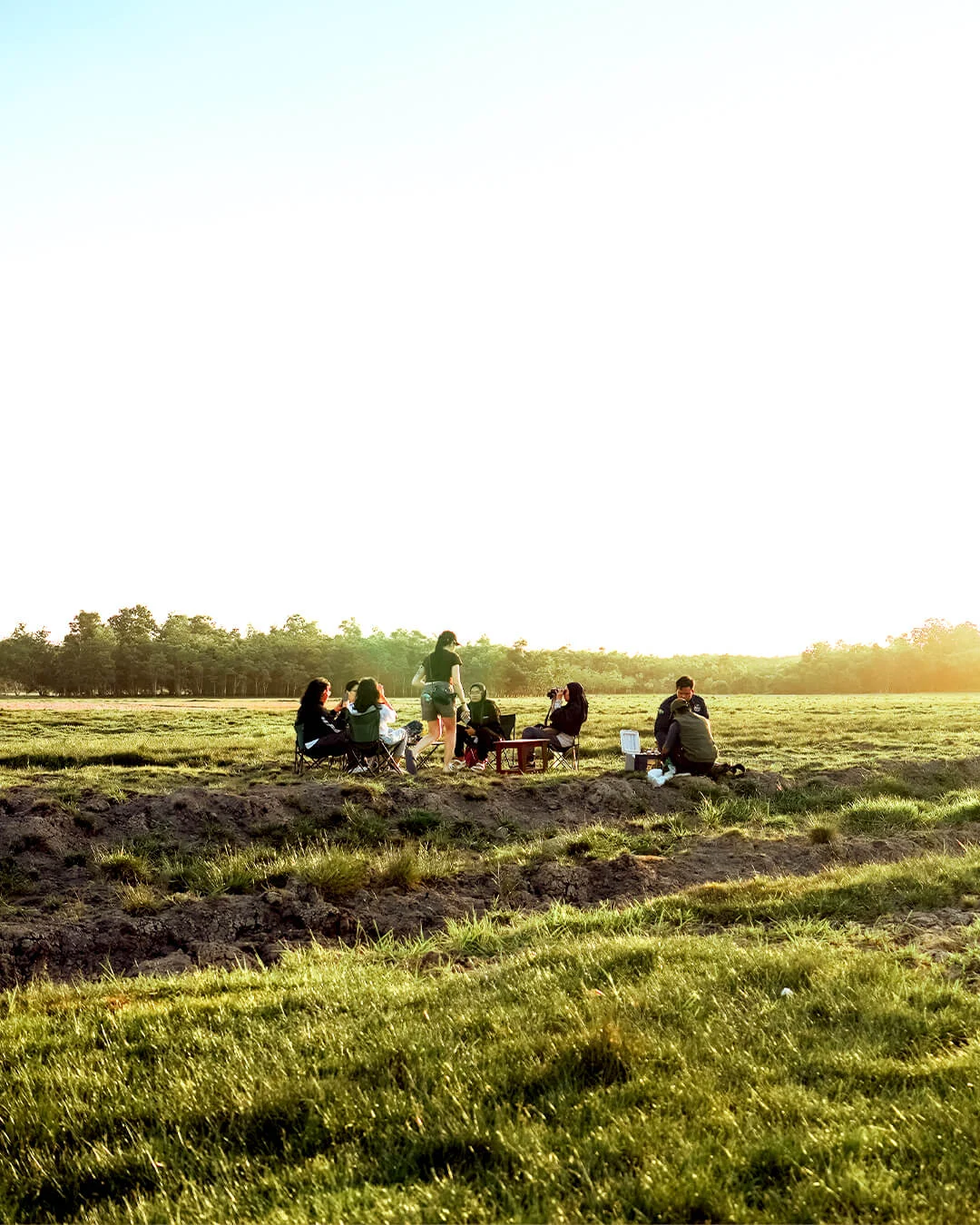 Watch sunset over wide savanna.